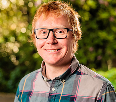 headshot of Mark Raleigh