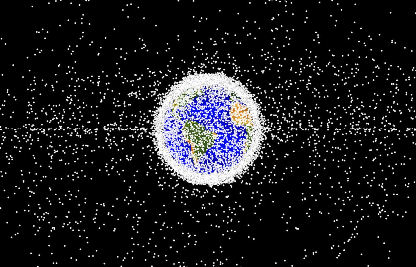 many many white dots clustered around Earth in space