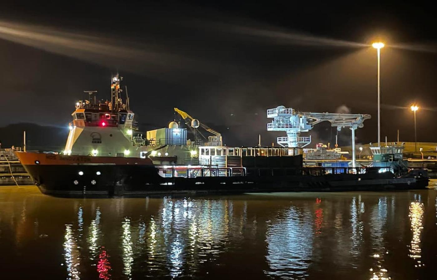 ship going through the Panama Canal at night