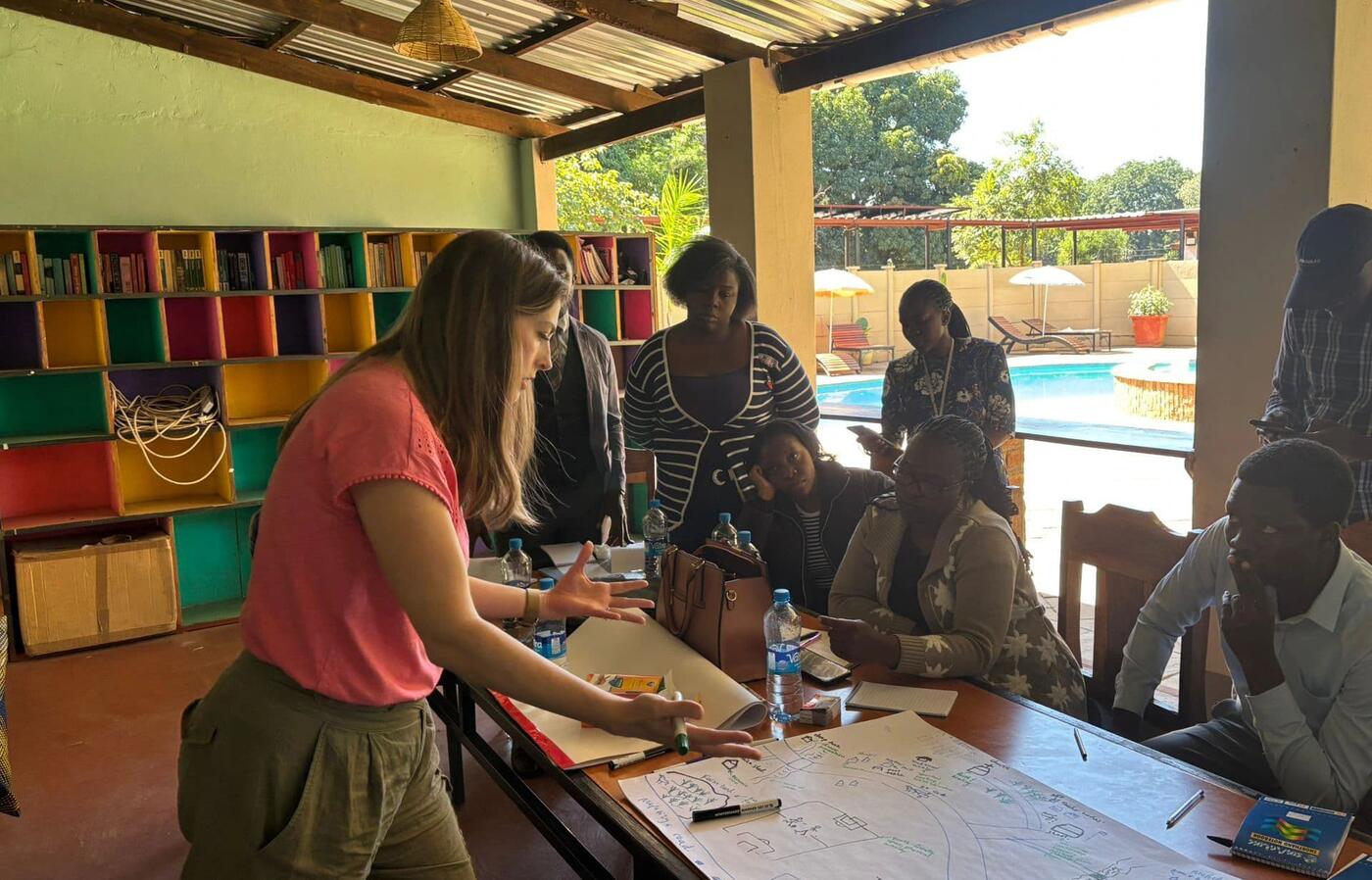Laura Peters and others around a table