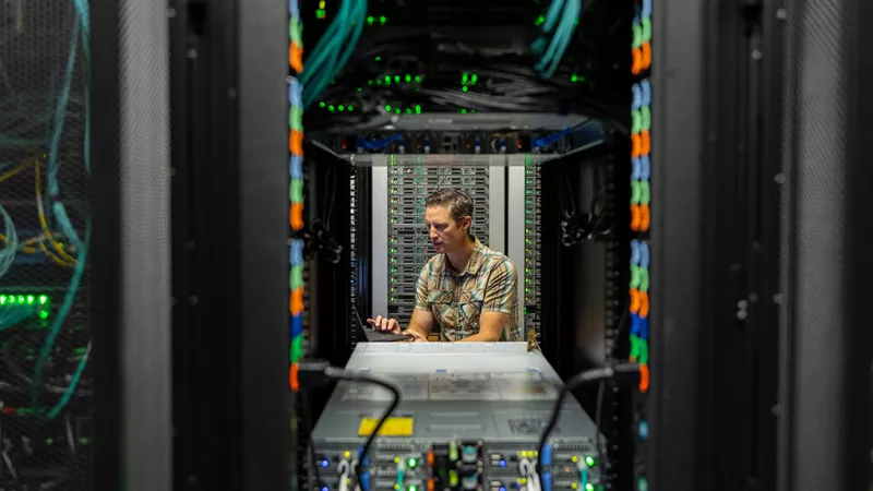 person in a computer server room