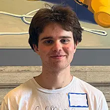 headshot of Sebastian Moreno-Comstock