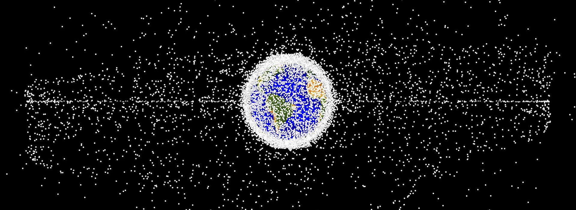 many many white dots clustered around Earth in space