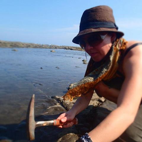 geologist with a rock hammer