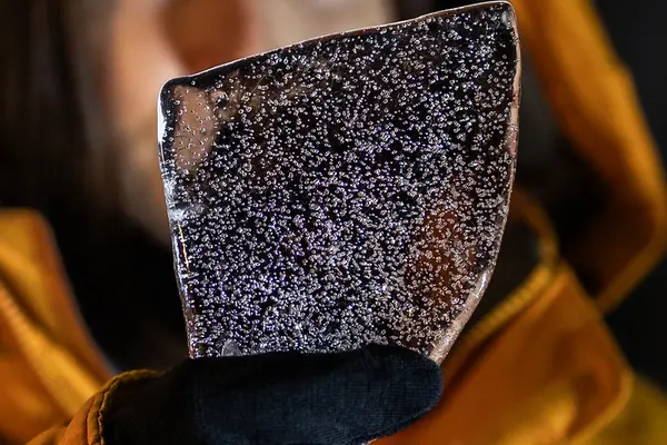 CO2 bubbles frozen in a chunk of ice