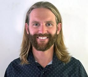 headshot of Trevor Hildebrand