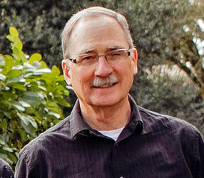 headshot of Bill Rugh